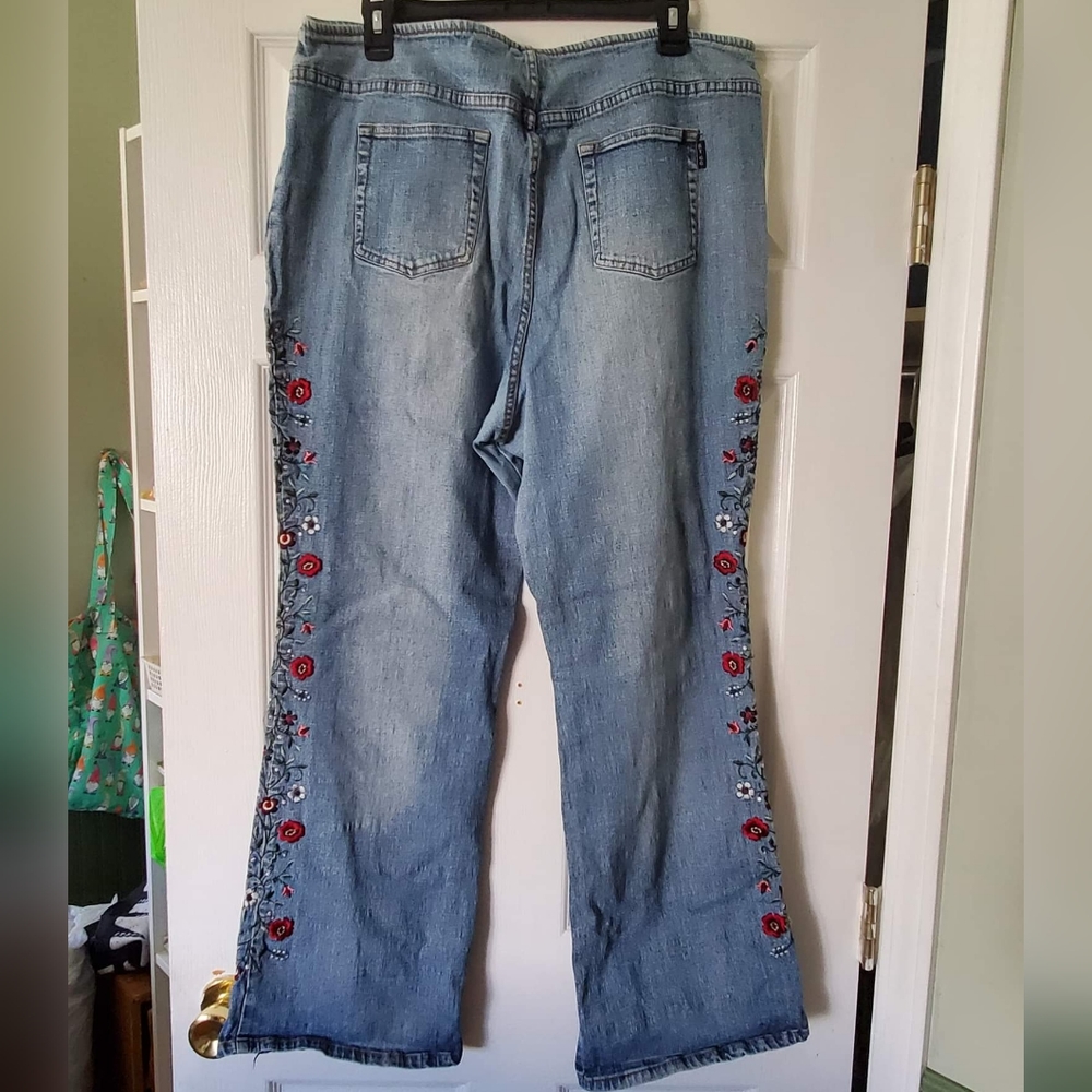 Jeans with embroidered roses down each leg size 20